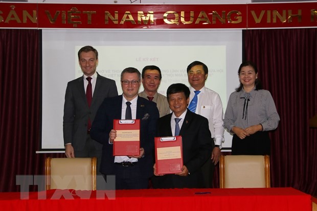 ttxvn-hoi-nha-bao-viet-nam-ky-ket-hop-tac-voi-belarus-1-1670297377.jpg