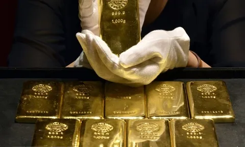 Giá vàng thế giới phiên 1/2 giảm sau quyết định tăng lãi suất của Fed